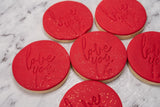 Cake Creations by Kate™ "Love you" embossed red fondant cookies with gold splash